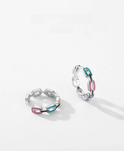 Close-up of S925 sterling silver earrings with colorful enamel chain link detail