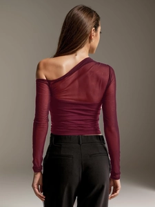 Detailed back view of burgundy mesh patchwork long sleeve top with sheer fabric texture