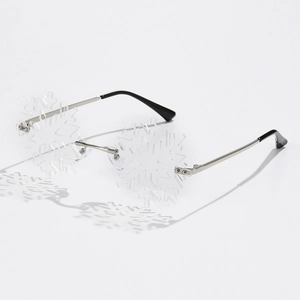 Fashionable rimless snowflake shaped sunglasses with silver metal frame and clear lenses
