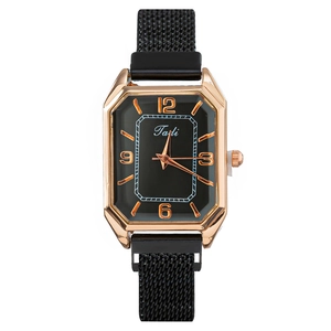 Women's rose gold rectangular quartz watch with black Milanese magnetic band on white background