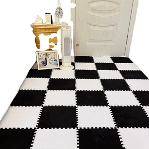 Interlocking foam floor mats with a classic black and white checkered pattern for room decor
