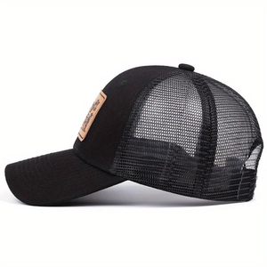 Black mesh trucker hat with a brown leather animal patch on the front, outdoor style