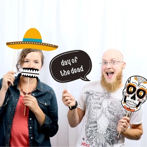 21-piece Day of the Dead photo booth props kit with Mexican sugar skull masks and sticks