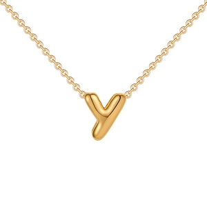 Detail view of a 18K gold-plated bubble letter 'y' pendant with a polished finish