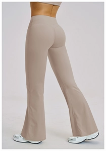 Rear view of high waist flared yoga pants showing butt lifting and shaping fit details