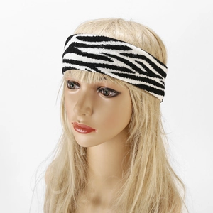 Knitted zebra pattern headband with elastic fabric for sports and fitness shown on model