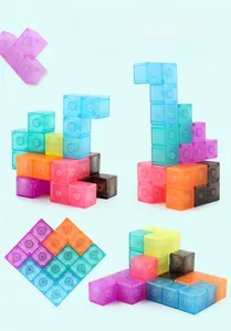 Macro view of colorful translucent magnetic building cubes showing creative 3D structures