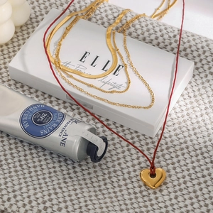Layered 18K gold stainless steel necklace with flat snake chain and red heart pendant