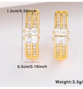 Detail view of gold hoop earrings with double zircon inlay and precise dimensions