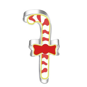 Macro detail of silver candy cane cookie cutter with red bow and stripe patterns