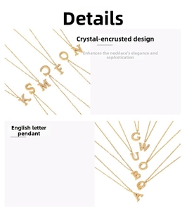 Detailed view of crystal-encrusted gold letter pendants on fine titanium steel chains