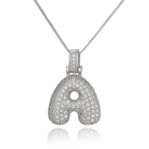 Macro shot of silver letter A pendant necklace with micro-pave cubic zirconia crystals