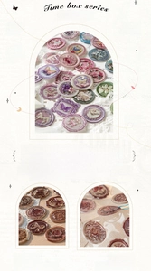 Macro detail of vintage 3D wax seal stickers featuring floral and butterfly designs