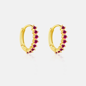 Detail of gold-plated silver hoops featuring seven vibrant red zircons with a mirrored base