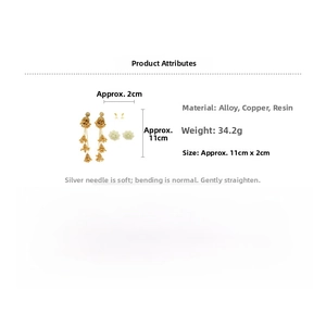 Detailed view of layered bell drop earrings and floral studs with dimensions and weight