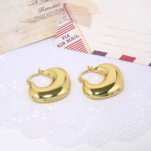 Bohemian gold chunky hoop earrings with a polished finish and retro chunky style
