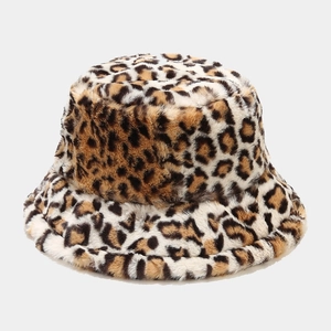 Detailed close-up of soft leopard print faux fur texture on a winter bucket hat