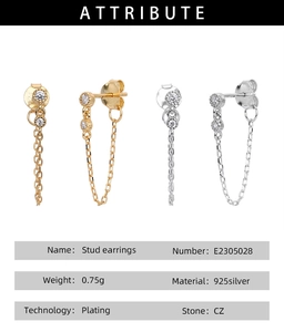 Détail de boucles d'oreilles chaînes en argent 925 avec diamants CZ en or et argent