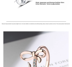 Detail view of adjustable rose gold bow ring with sparkling zircon inlays for women