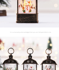 Detail of bronze Christmas lantern with festive motifs and warm LED light decoration