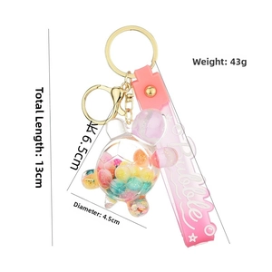 Detail showing 13cm turtle keychain dimensions with bubble oil beads and lobster clasp