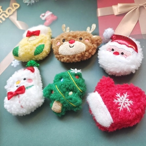 Detailed plush Christmas brooches featuring Santa, reindeer and tree with embroidery