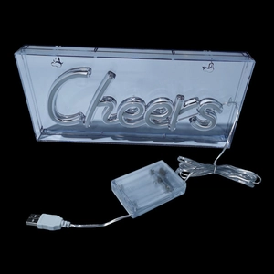 Detail of Cheers LED neon sign with acrylic backing, USB plug, and battery box power supply