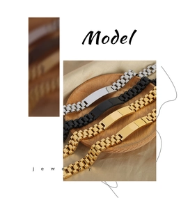 Detailed view of geometric titanium steel link bracelets in silver, black and gold finishes