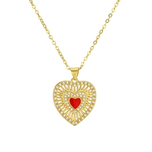 Close-up of golden double-heart pendant necklace with red enamel and pavé crystals