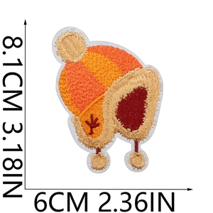 Detail view of orange winter hat embroidery patch with clear 8.1cm x 6cm dimensions