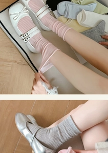 Elastic ribbed cotton socks in pastel pink and grey shown with Mary Jane shoes