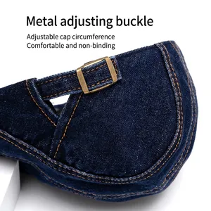 Washed denim newsboy hat with adjustable bronze metal buckle for custom fit