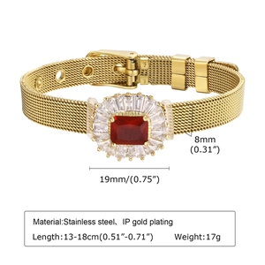 Detail of gold stainless steel mesh bracelet with red zircon and white stones