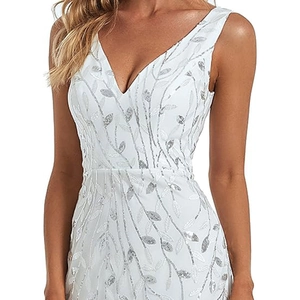 Elegant white V-neck evening gown with silver sequins and sleeveless fishtail design