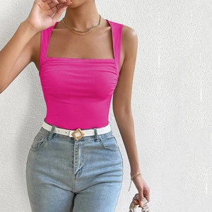 Close-up of rose pink ribbed knit tank top featuring a square neck and slim fit texture