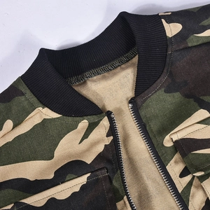 Detail shot of camouflage vest featuring ribbed collar and high-quality zipper hardware