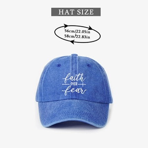 Detail showing the adjustable 56-58cm hat size on the blue Faith baseball cap