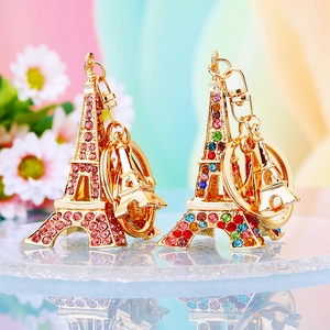 Sparkling Eiffel Tower keychains with pink and colorful rhinestones on golden metal base