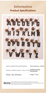Detailed grid of leopard print faux leather alphabet keychains with brown pom poms