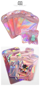 Macro view of holographic iridescent zip lock bags with hanging holes for jewelry packaging