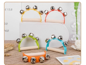 Detail of colorful half-round hand bells with wooden handles and metal jingle bells