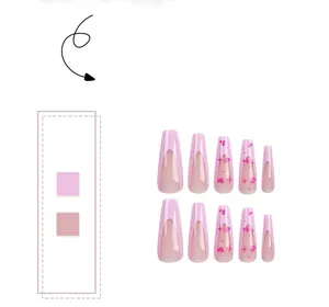 Detailed view of pink French heart press-on nails in long coffin shape design