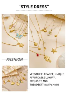 Detailed shot of gold-plated sea shell and starfish pendants with colorful beads