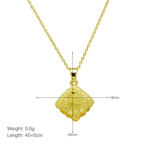 Detailed macro of textured 18k gold-plated square pendant with 18x26mm size measurements