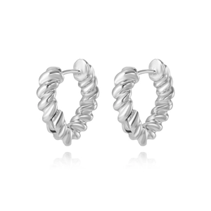 Close-up of silver heart-shaped hoop earrings with a twisted metallic texture on white background
