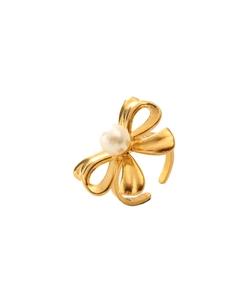 Detail of 18k gold butterfly ring featuring a white round pearl and adjustable open band