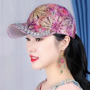Stylish women's baseball cap with purple floral print and sparkling rhinestones