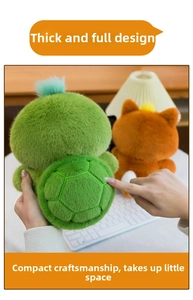 Detail of plush turtle and brown kitten toys featuring soft thick long fur and compact size