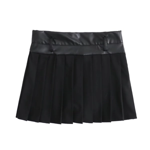 Women's black high-waisted pleated mini skirt with faux leather and fabric patchwork