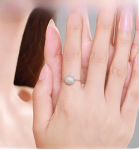 Macro shot of S925 sterling silver chain ring with micro-pave diamond ball detail